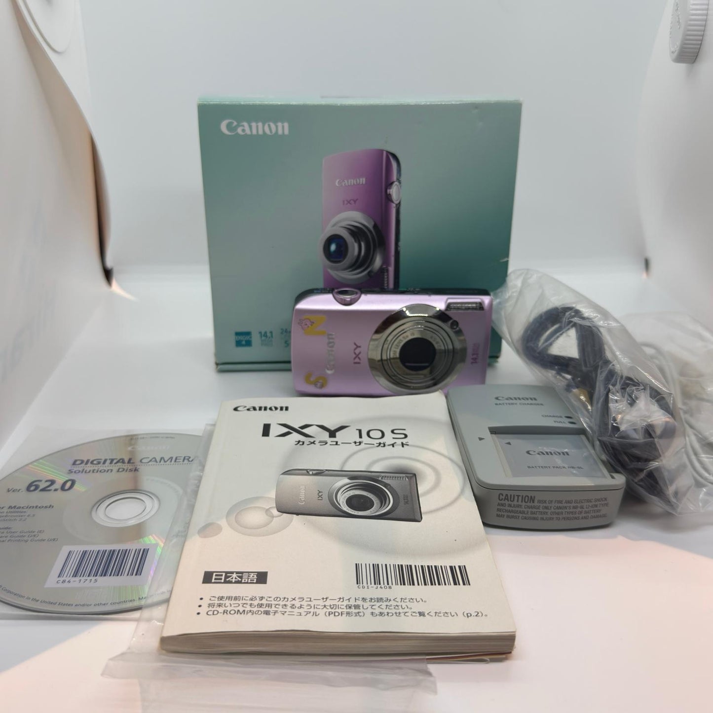 【全額返金保証】【最速発送】Canon コンパクトデジタルカメラ IXY 10S パープル 美品 動作確認済