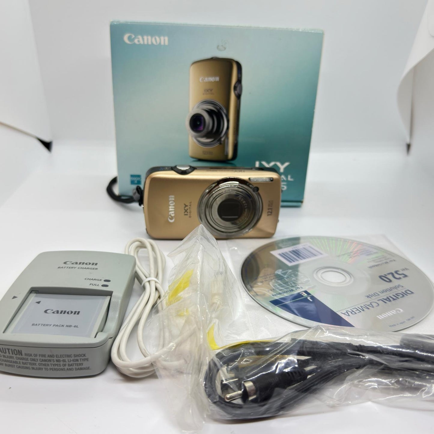 【全額返金保証】【最速発送】Canon コンパクトデジタルカメラ IXY DIGITAL 930 IS ブラウン 動作確認済