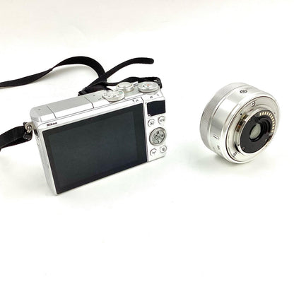 【全額返金保証】【最速発送】Nikon デジタル一眼 Nikon 1 J5 標準パワーズームレンズキット シルバー 動作確認済