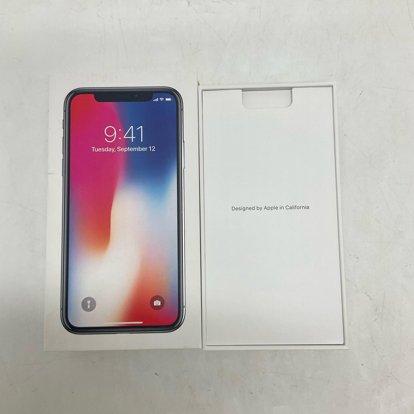 【全額返金保証】【最速発送】Apple iPhone iPhone X 64GB スペースグレイ au 白ロム 動作確認済 70%