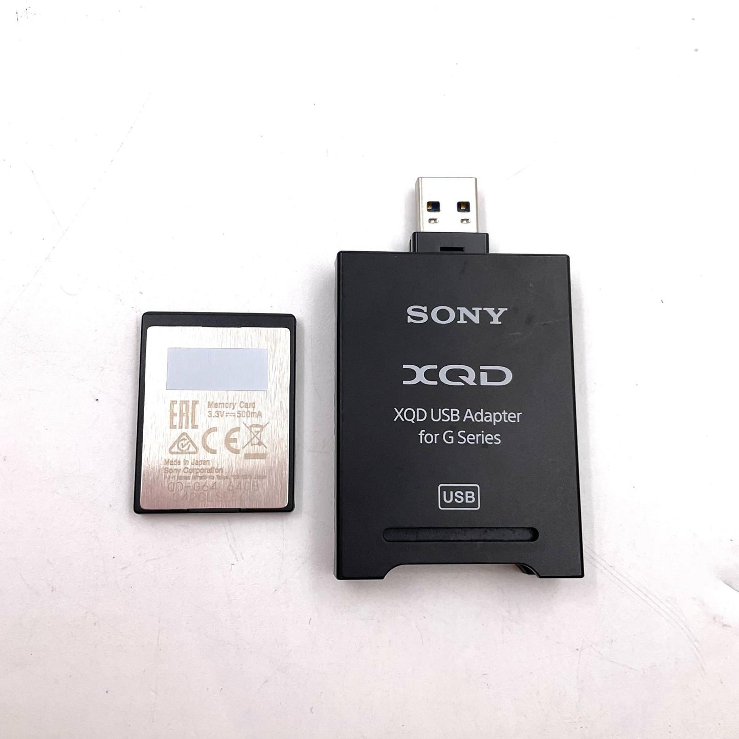 【全額返金保証】【最速発送】Sony XQDメモリーカード Ｇシリーズ SONY QD-G64 64G＋SONY XQD USBアダプター 美品 動作確認済