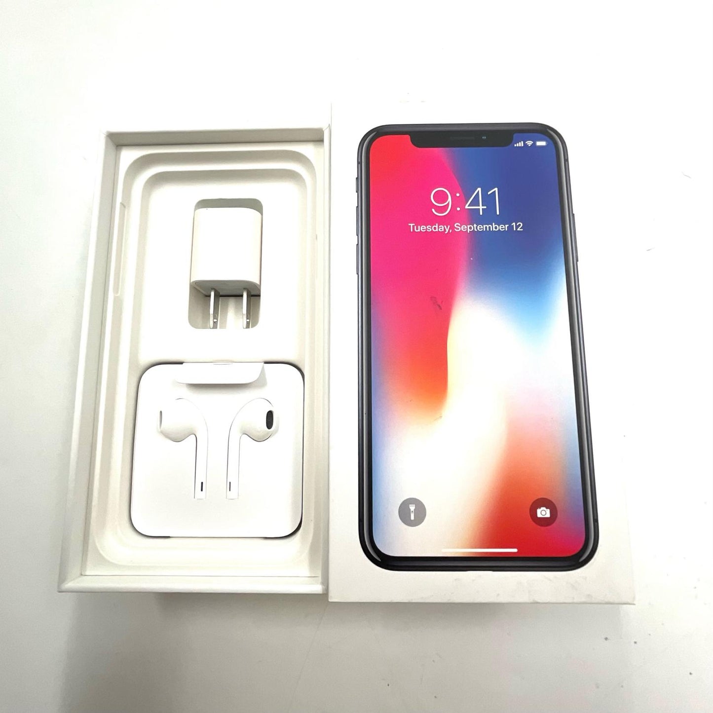 【全額返金保証】【最速発送】Apple iPhone iPhone X 64GB スペースグレイ docomo SIMフリー 白ロム 動作確認済 83%